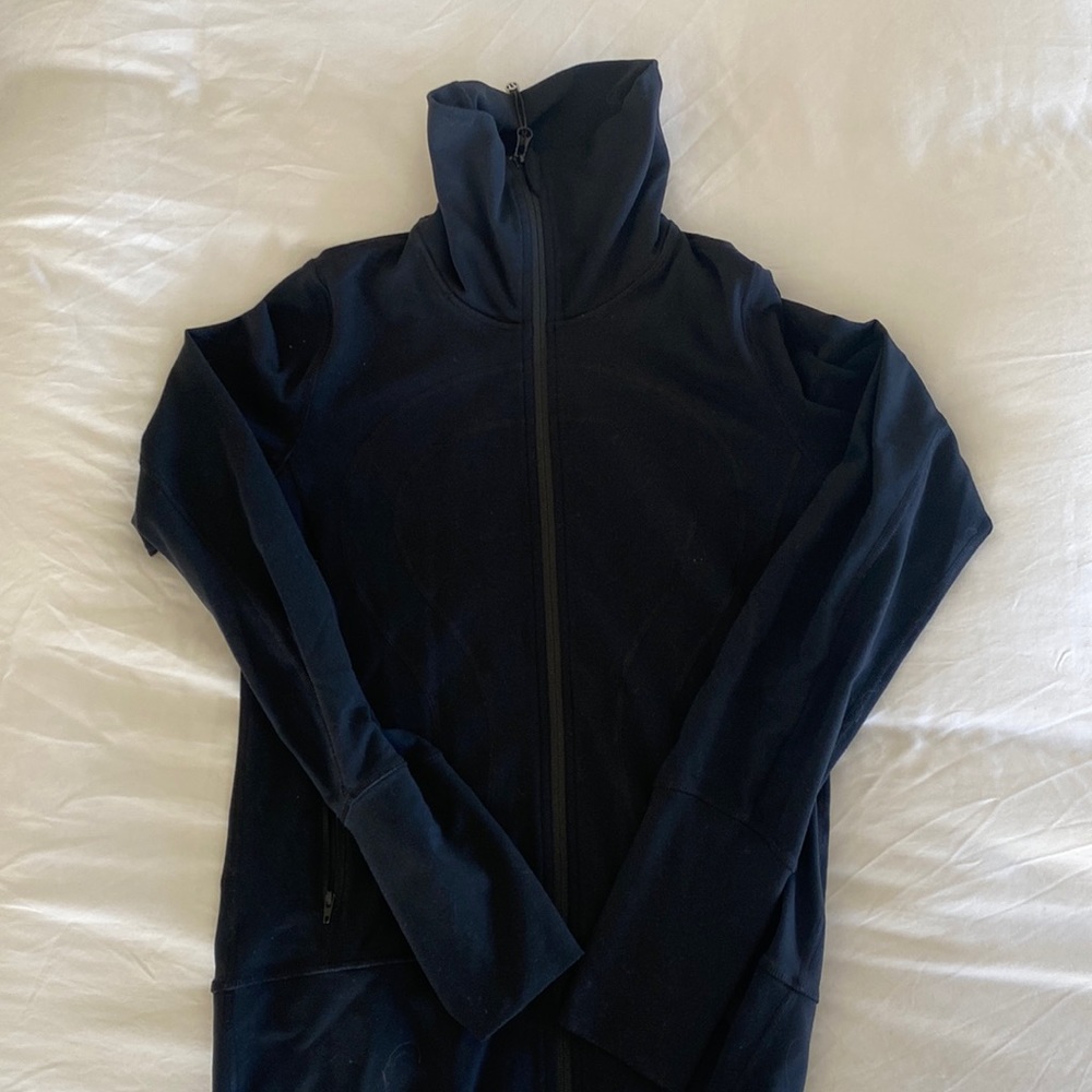 Black Lululemon jacket. High zip collar. Size 6.